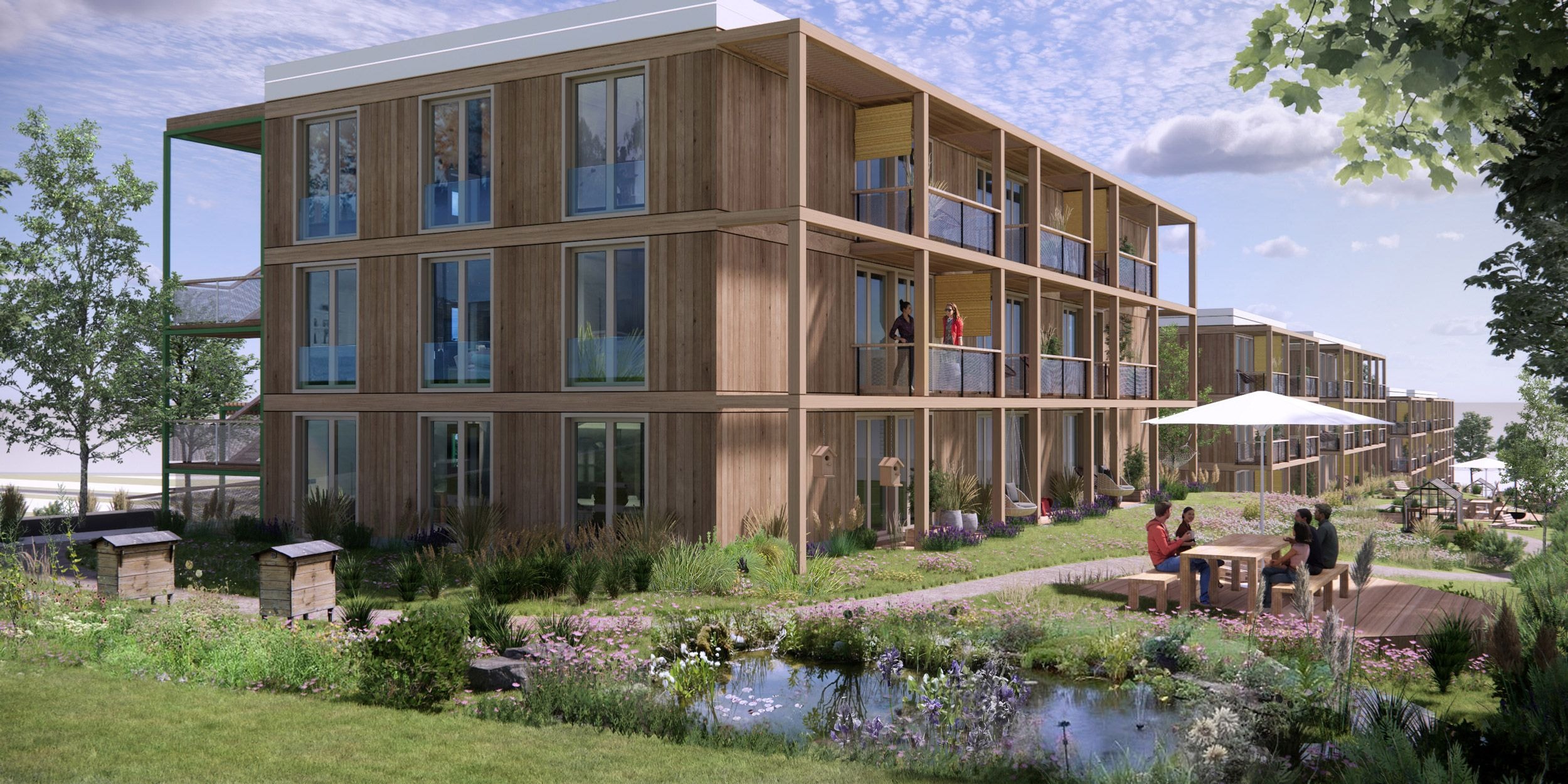 Wohnhäuser mit den Bewohnern drumherum